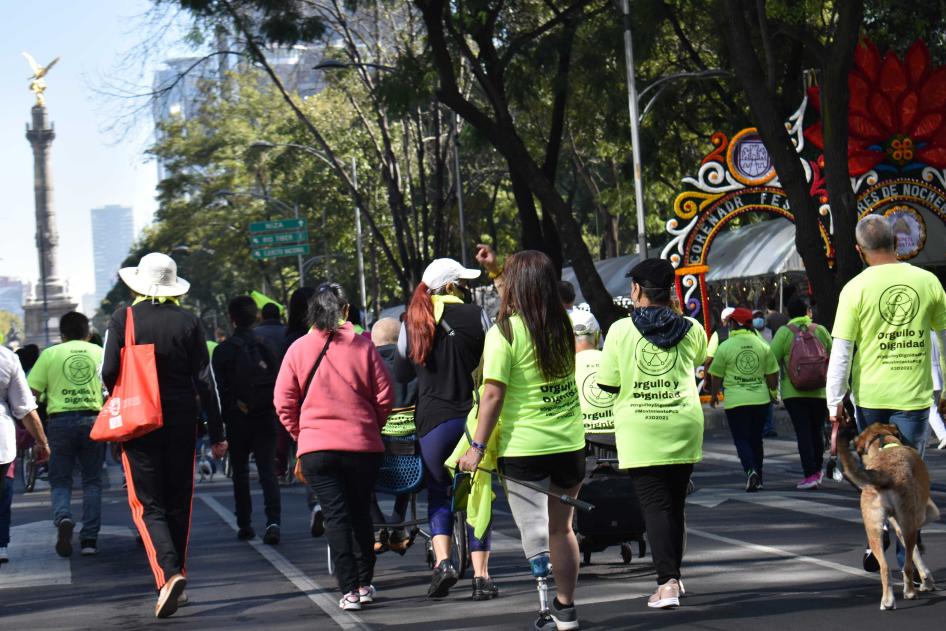 Hundreds of people with disabilities demonstrate to demand visibility and their right to be included in society.