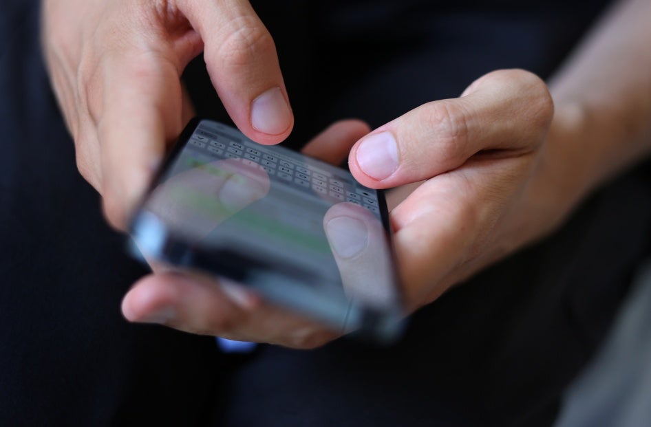 A message is typed on a smartphone, July 2022. 