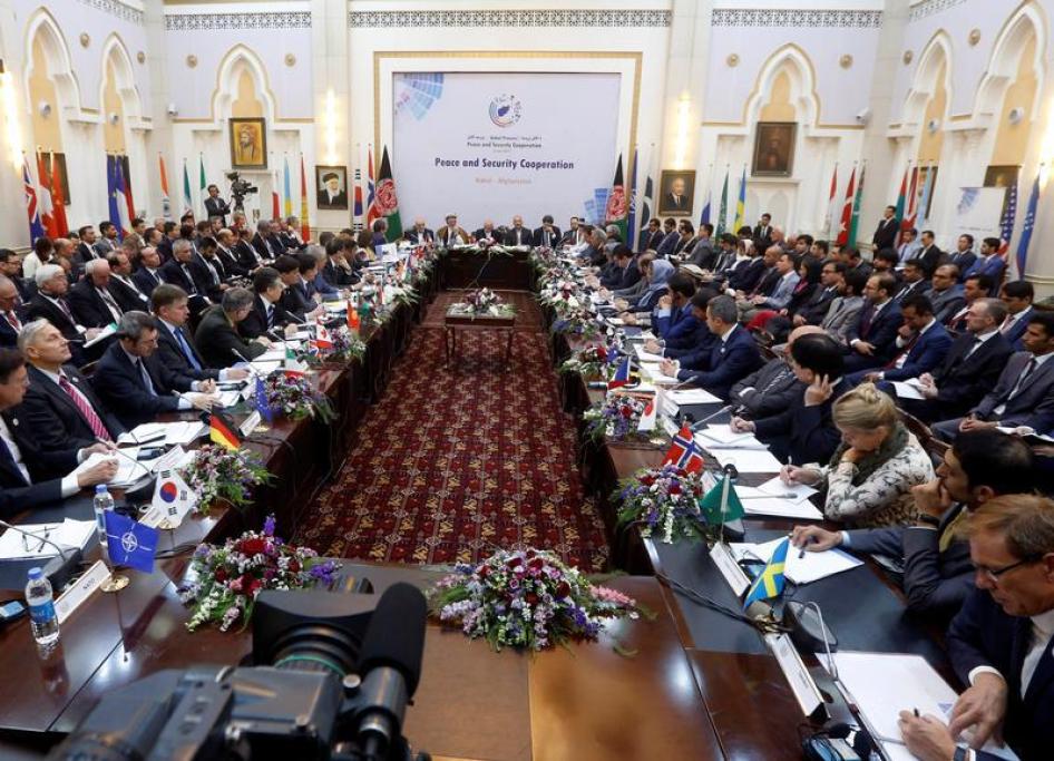 Foreign delegation members listen as Afghan President Ashraf Ghani delivers a speech during a peace and security cooperation conference in Kabul, Afghanistan June 6, 2017.