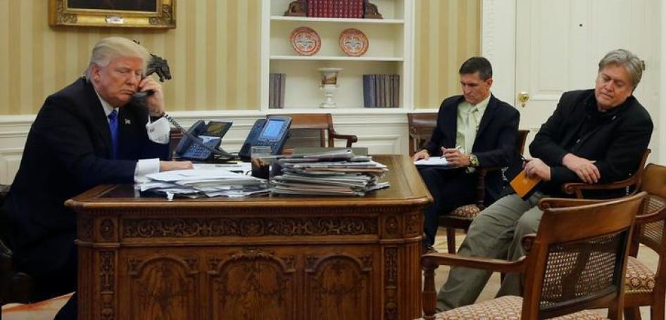 US President Donald Trump speaks by phone with Australia’s Prime Minister Malcolm Turnbull at the White House in Washington, DC, on January 28, 2017. 