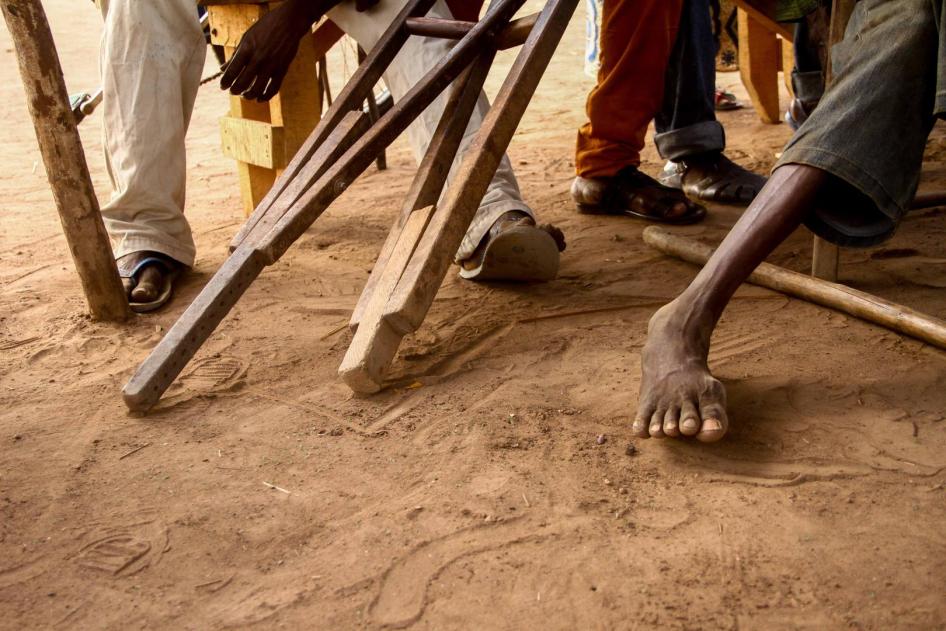 People with disabilities living in displacement camps in Kaga-Bandoro hold a meeting in April 2017. The group convenes each Sunday, and members say they receive very little assistance. 