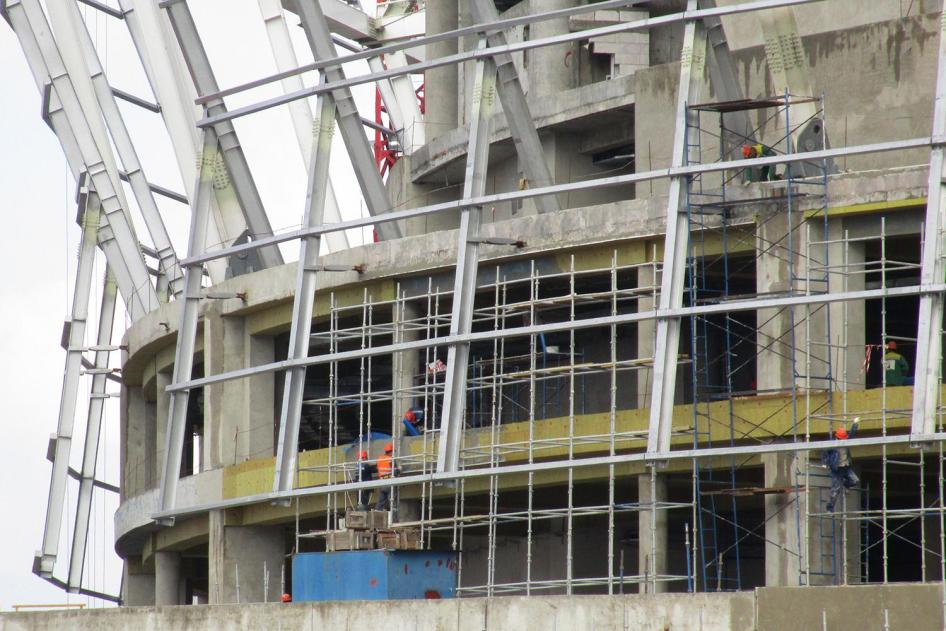 Workers building the Rostov Arena, a 2018 World Cup venue in Rostov-on-Don, Russia, in September 2016.