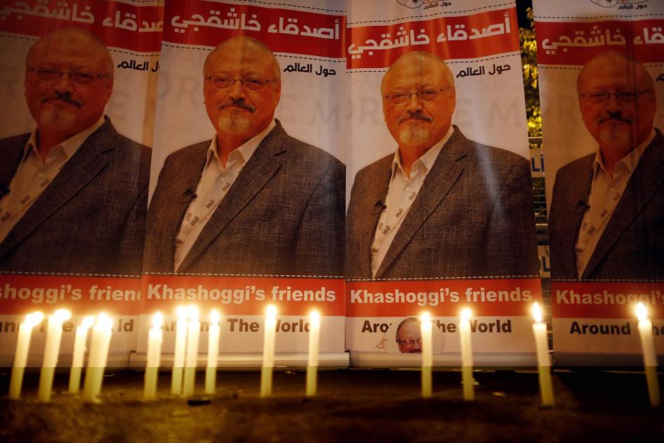 Candles lit by activists protesting the killing of Saudi journalist Jamal Khashoggi are placed outside Saudi Arabia's Consulate in Istanbul. © 2018 Lefteris Pitarakis/AP Photo