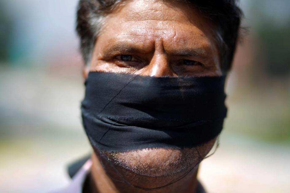 A journalist protests a set of laws that threaten to curb free speech, Kathmandu, Nepal, September 19, 2018.