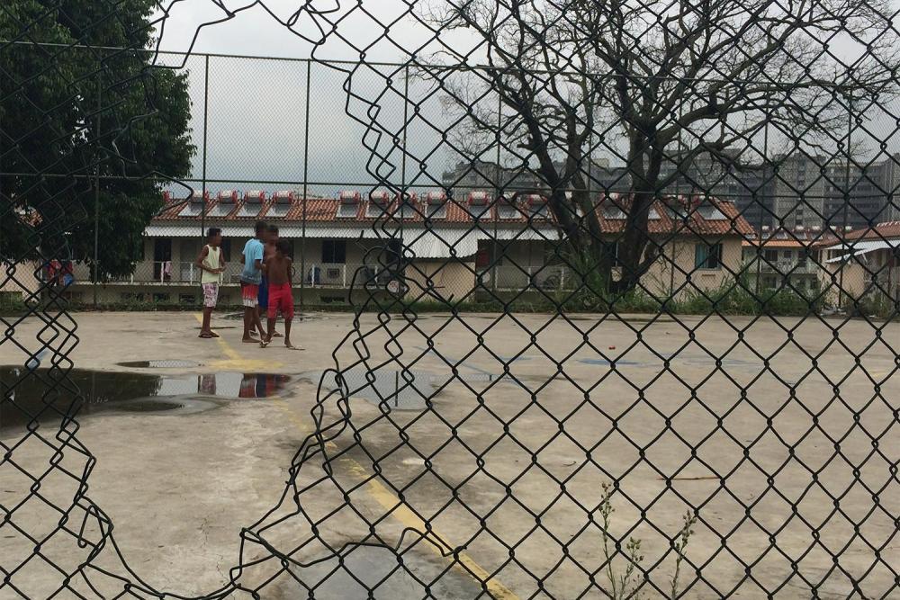 Children play with kites at the Mangueira favela on January 14, 2016.