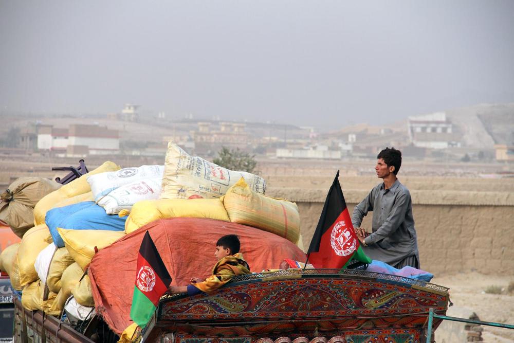Some of the 360,000 Afghan refugees forced out of Pakistan in the second half of 2016 arrive at the UN refugee agency’s support center outside Kabul after an overnight journey. After living in Pakistan for decades, returning refugees hire trucks to transp