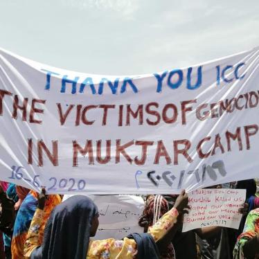 Displaced people living in Ardamata camp in El Geneina, capital of West Darfur, welcoming the start of proceedings in the case against “Janjaweed” militia leader Ali Kosheib at the International Criminal Court. Photos courtesy of Radio Dabanga www.dabangasudan.org. 