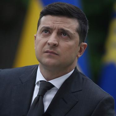 Ukraine President Volodymyr Zelensky looks on during a press conference in the garden of the Mariinsky Palace in Kyiv, May 22, 2020.