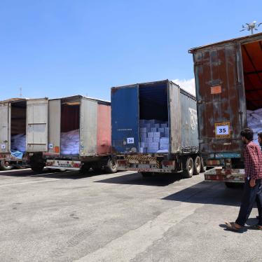 UN humanitarian aid trucks enter northwest Syria through the Bab al-Hawa border crossing with Turkey on June 1, 2021