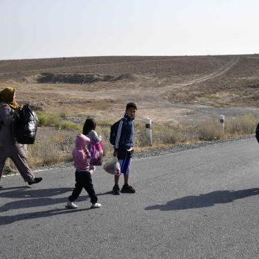 People walking along a road 