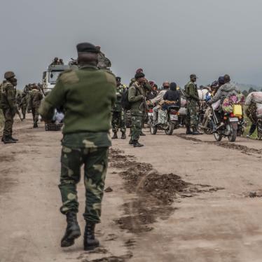 People fleeing fighting between Congolese forces and M23 rebels near Kibumba in North Kivu, Democratic Republic of Congo, May 24, 2022.