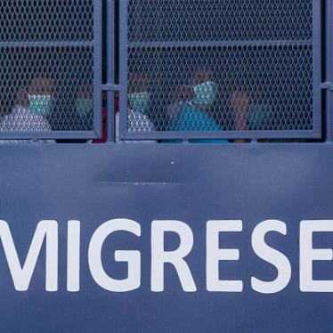 An immigration vehicle takes Myanmar nationals to a Malaysian naval base for deportation, February 23, 2021.