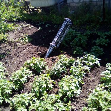 The carrier section of an 9M27K-series Uragan rocket that landed outside the home of a woman living on left bank of the Siverskiy Donets River while Russian forces occupied the area in 2022.  Each rocket delivers 30 9N210 or 9N235 submunitions. 