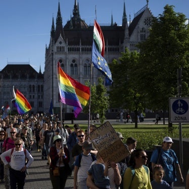 Hungarians march in downtown Budapest to protest against the previous government’s law banning LGBTQ+ Pride events, May 1, 2025.