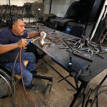 A man with a physical disability builds mobility products for underserved communities in Cairo, Egypt, August 8, 2017.