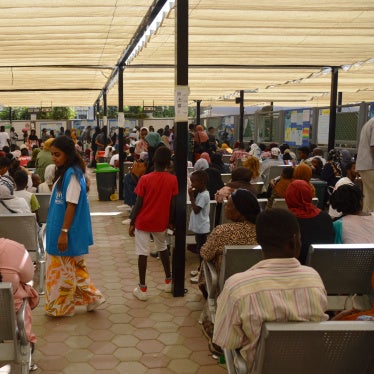 Asylum seekers sit in a UNHCR registration center in Cairo, Egypt on July 25, 2023. 