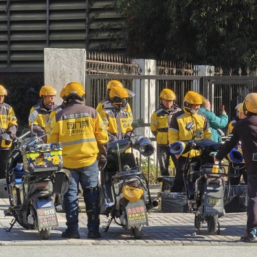 Food delivery workers are lining up to collect orders in Shanghai, China, January 14, 2024. 