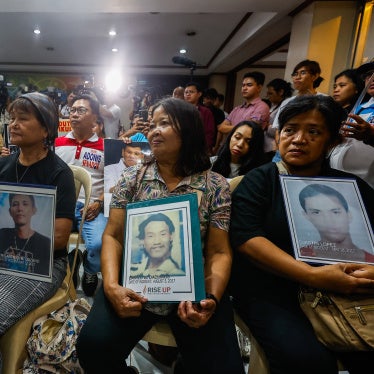 Family members of “drug war” victims watch the livestream of former Philippine President Rodrigo Duterte’s initial appearance at the International Criminal Court for alleged crimes against humanity, in Quezon City, Philippines, March 14, 2025. 