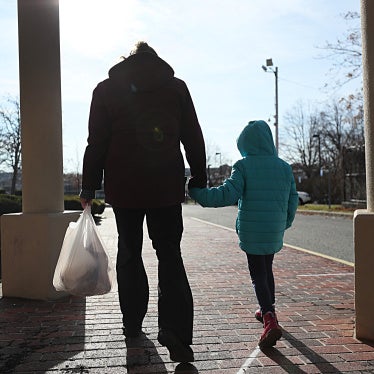 A woman and her daughter in Revere, Massachusetts, US, December 11, 2020.