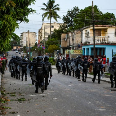 Riot police walk the streets after a demonstration against the government of President Miguel Diaz-Canel in Arroyo Naranjo Municipality, Havana, Cuba, on July 12, 2021.
