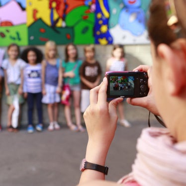 Students taking a group photo. 