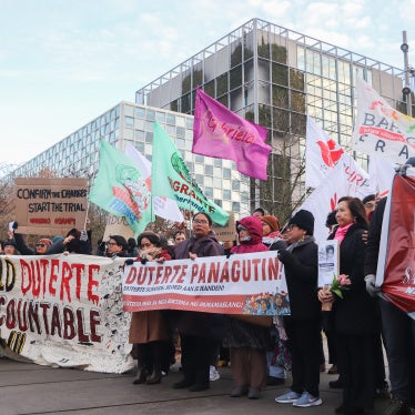 Victims’ families and activists gather outside the International Criminal Court in The Hague to demand justice for the thousands of people killed during the abusive “drug war” of former Philippine President Rodrigo Duterte, February 23, 2026.