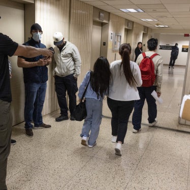 Plainclothes Immigration and Customs Enforcement (ICE) officers detain an immigrant leaving their scheduled court appearance at a Federal immigration court in New York City, June 4, 2025.