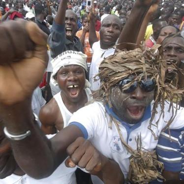 People attend the rally of the opposition National Coalition for Change (CNC) in Yopougon district, Abidjan, Côte d’Ivoire on October 7, 2015.
