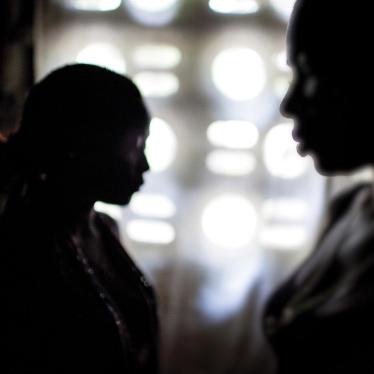 Selene (right) and her partner (left) were forced out of their previous home in Monrovia, Liberia, when their landlord discovered their romantic involvement. They have since moved to a new home further out of town, along with one son and nephew. 