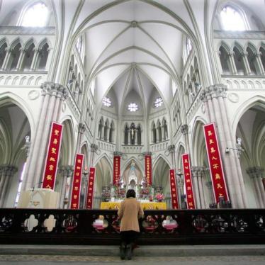 A Chinese Catholic prays on Easter Sunday at the state-sanctioned Saint Ignatius Cathedral in Shanghai.