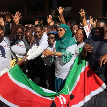 Kenya's Lands Minister and principal secretary in the Lands and Physical Planning Ministry welcome a group of women on October 13, 2016 who will climb Mount Kilimanjaro on October 14 as part of a campaign for land rights in Nairobi, Kenya.
