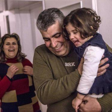 Mohammed finally spends time with his children and wife in their new home in Germany. © 2017 Anna Pantelia