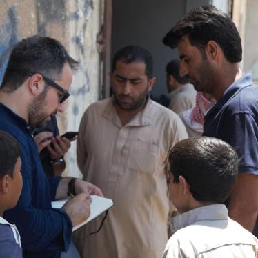 Author interviewing local Tabqa residents after ISIS had been pushed out of city (July 2017).