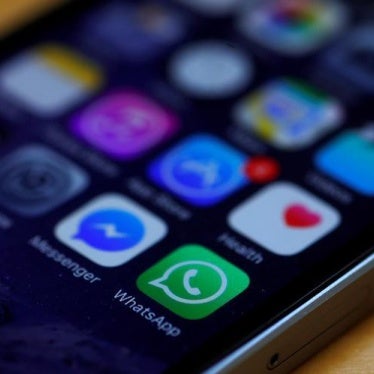 WhatsApp and Facebook messenger icons are seen on an iPhone in Manchester , Britain March 27, 2017.