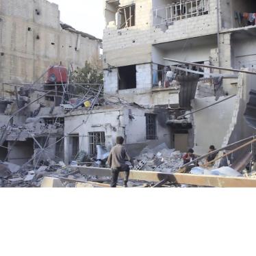 Children in the rubble of damaged buildings in the eastern Damascus suburb of Ghouta, Syria. 
