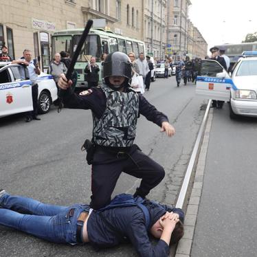 Police detain a protester in St. Petersburg, Russia.