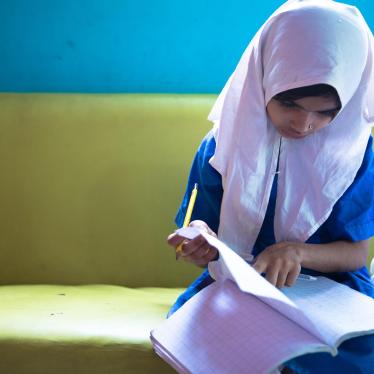 Laiba, age eight, a student at the lyari School. laiba’s older sister is not able to study at all because she is responsible for housework and caring for her younger siblings.