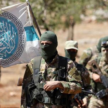 New fighters of the al-Qaeda-linked Hayat Tahrir al-Sham attend a mock battle in anticipation of an attack by Syrian government forces on northern Idlib province and the surrounding countryside, August 14, 2018.