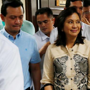 Sen. Antonio Trillanes IV, second left, escorts Vice President Leni Robredo, right, who visited him at the Philippine Senate Thursday, Sept. 6, 2018 in suburban Pasay city, south of Manila, Philippines. 