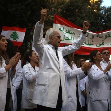 Lebanese doctors chant slogans as they take part in anti-government demonstrations in central Beirut on November 12, 2019. 